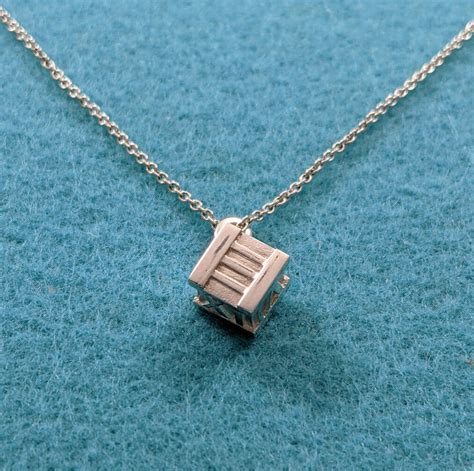 tiffany roman numeral pendant